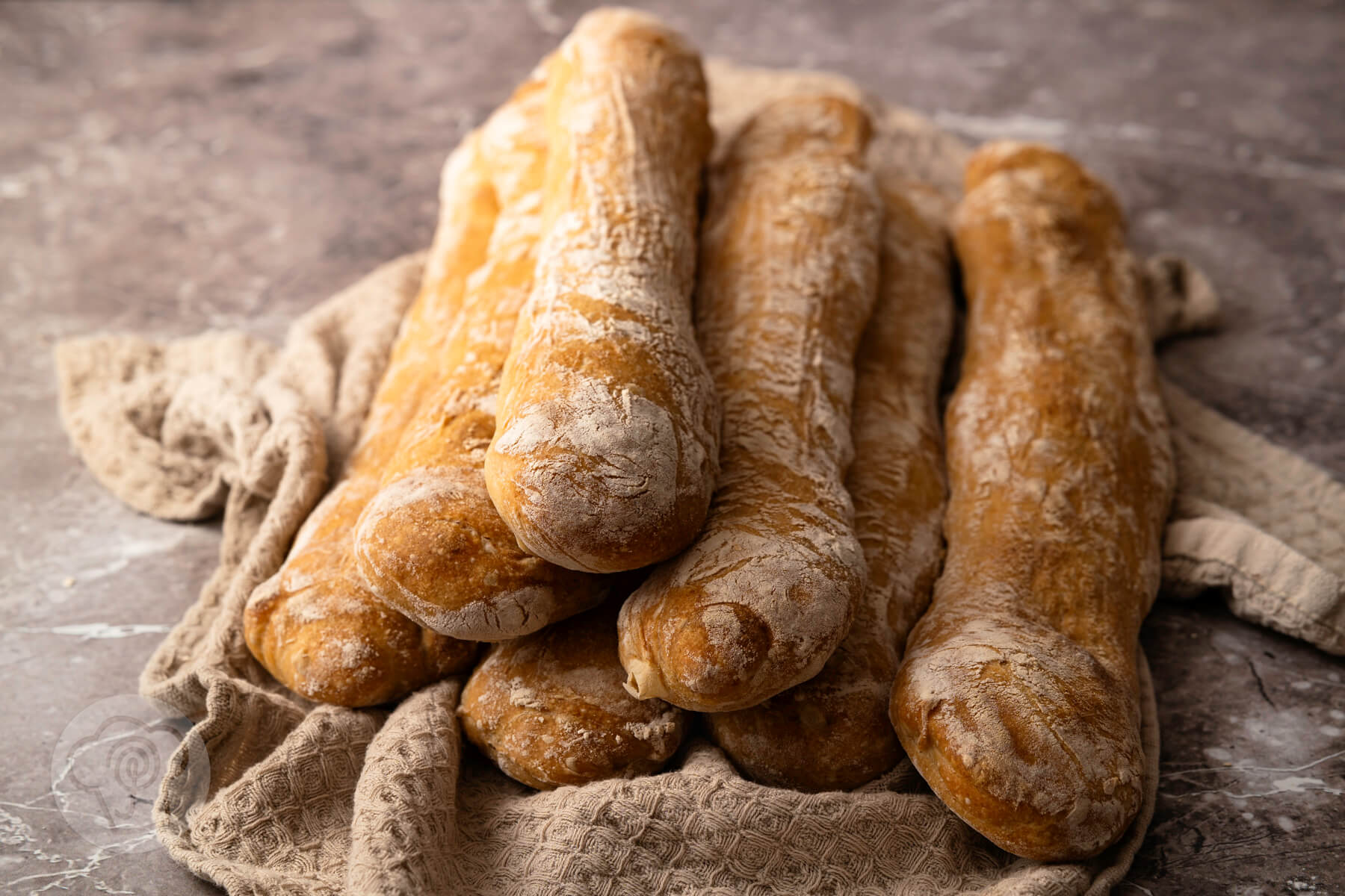 Mehr über den Artikel erfahren Pane stirato – Brotstangen mit Dinkel